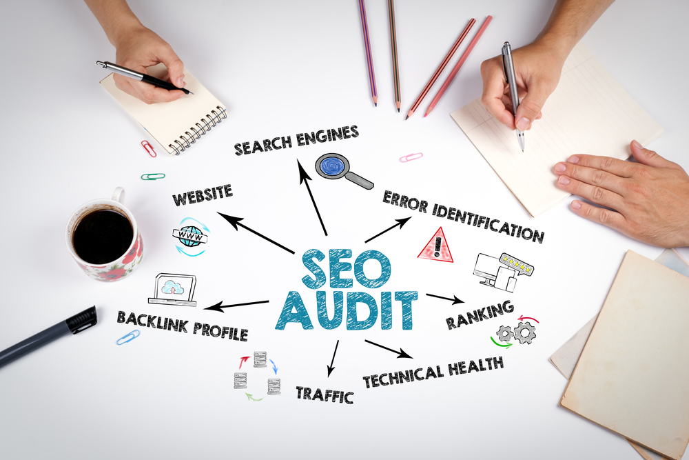 SEO Audit Concept. The meeting at the white office table.